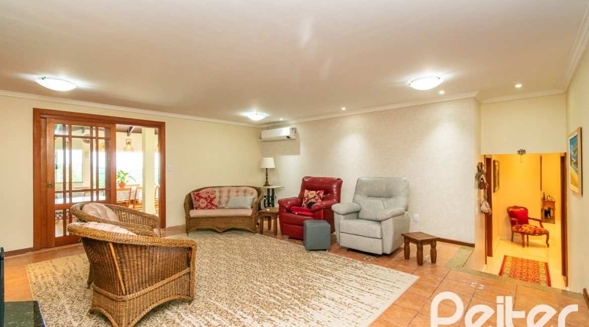 Casa em Condomínio à venda com 477m², 3 dormitórios, 1 suíte, 3 vagas, no bairro Nonoai em Porto Alegre