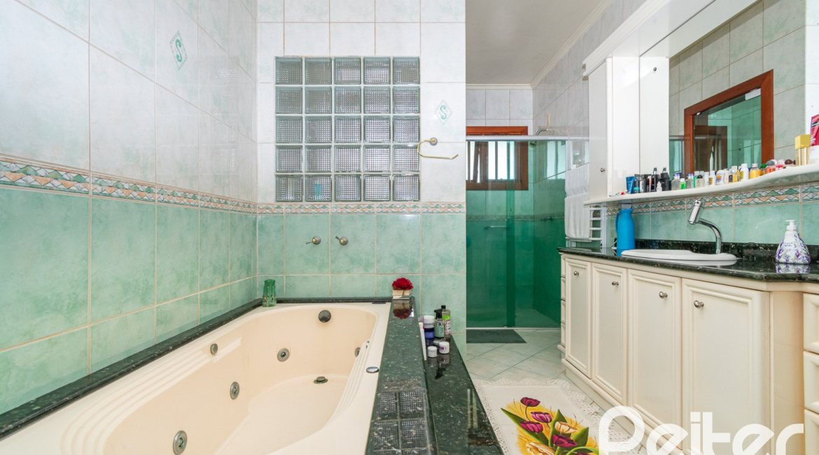 Casa em Condomínio à venda com 477m², 3 dormitórios, 1 suíte, 3 vagas, no bairro Nonoai em Porto Alegre