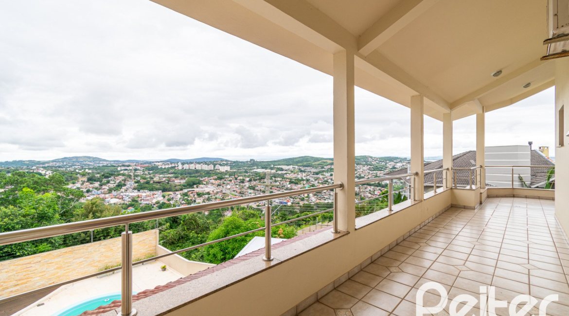 Casa em Condomínio à venda com 477m², 3 dormitórios, 1 suíte, 3 vagas, no bairro Nonoai em Porto Alegre