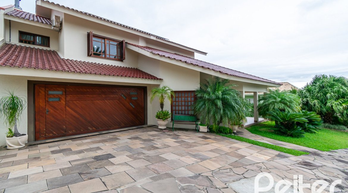 Casa em Condomínio à venda com 477m², 3 dormitórios, 1 suíte, 3 vagas, no bairro Nonoai em Porto Alegre