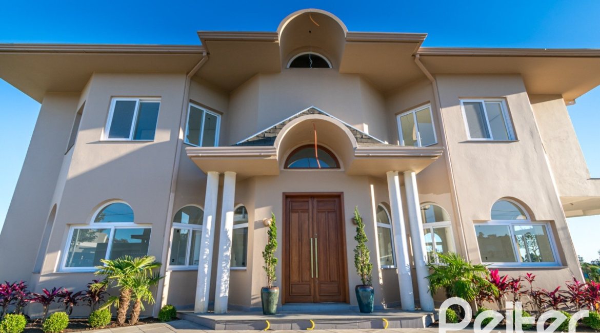 Casa em Condomínio à venda com 345m², 3 dormitórios, 3 suítes, 4 vagas, no bairro Alphaville em PORTO ALEGRE