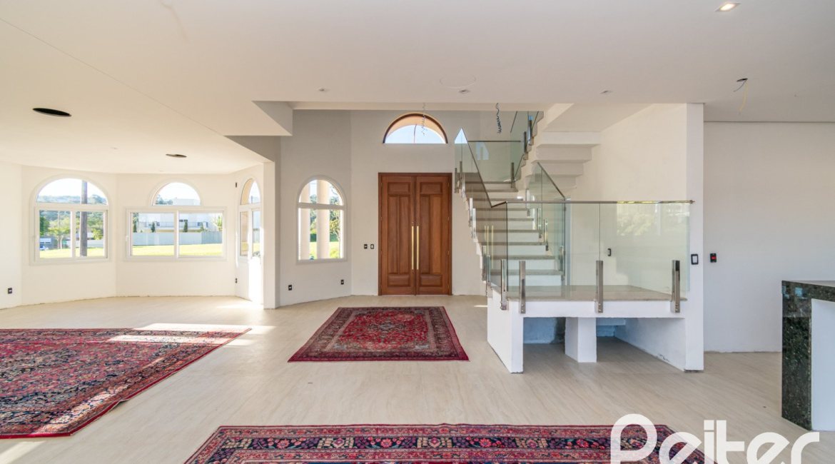 Casa em Condomínio à venda com 345m², 3 dormitórios, 3 suítes, 4 vagas, no bairro Alphaville em PORTO ALEGRE