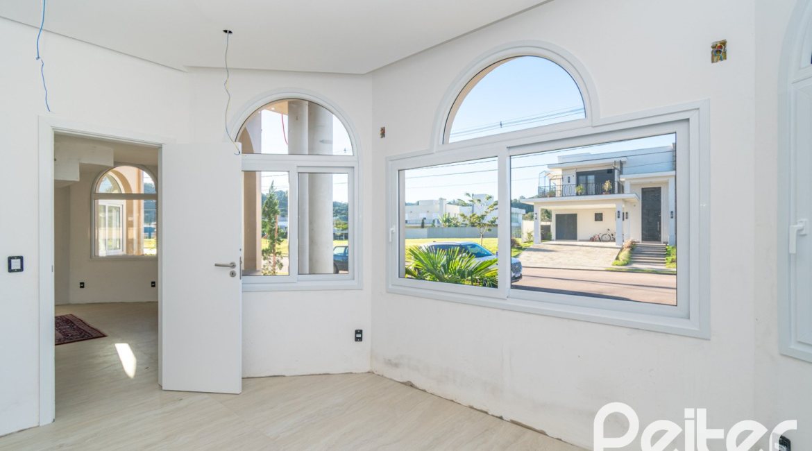 Casa em Condomínio à venda com 345m², 3 dormitórios, 3 suítes, 4 vagas, no bairro Alphaville em PORTO ALEGRE