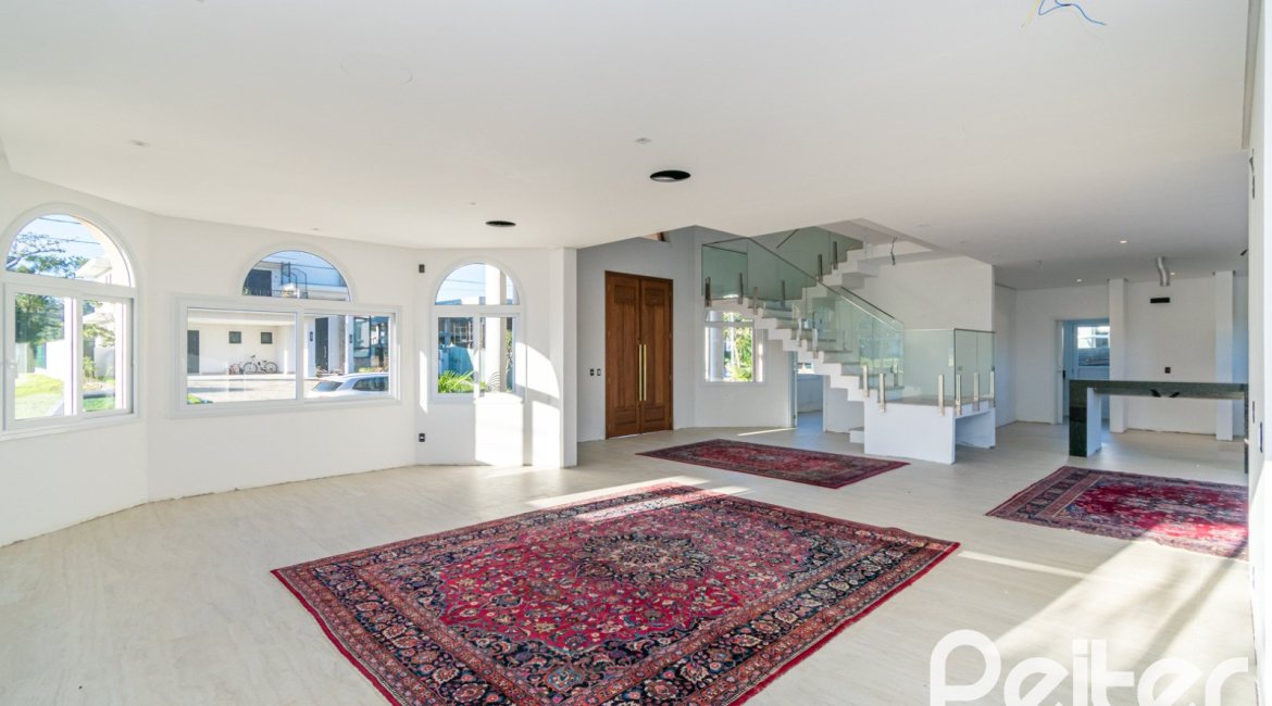 Casa em Condomínio à venda com 345m², 3 dormitórios, 3 suítes, 4 vagas, no bairro Alphaville em PORTO ALEGRE