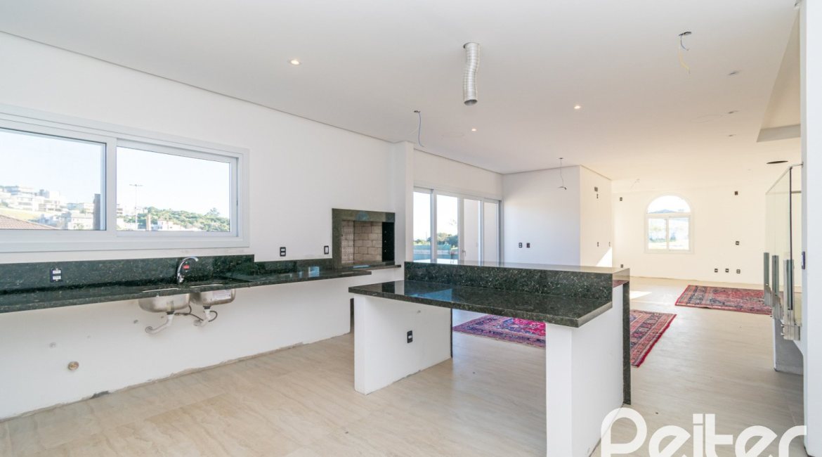 Casa em Condomínio à venda com 345m², 3 dormitórios, 3 suítes, 4 vagas, no bairro Alphaville em PORTO ALEGRE