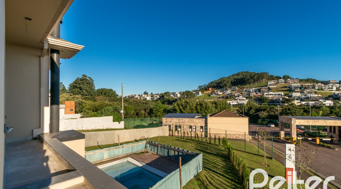 Casa em Condomínio à venda com 345m², 3 dormitórios, 3 suítes, 4 vagas, no bairro Alphaville em PORTO ALEGRE