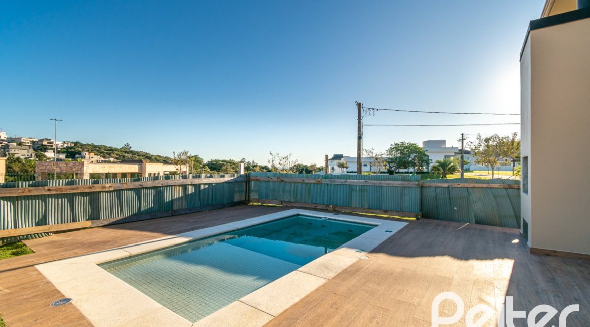 Casa em Condomínio à venda com 345m², 3 dormitórios, 3 suítes, 4 vagas, no bairro Alphaville em PORTO ALEGRE