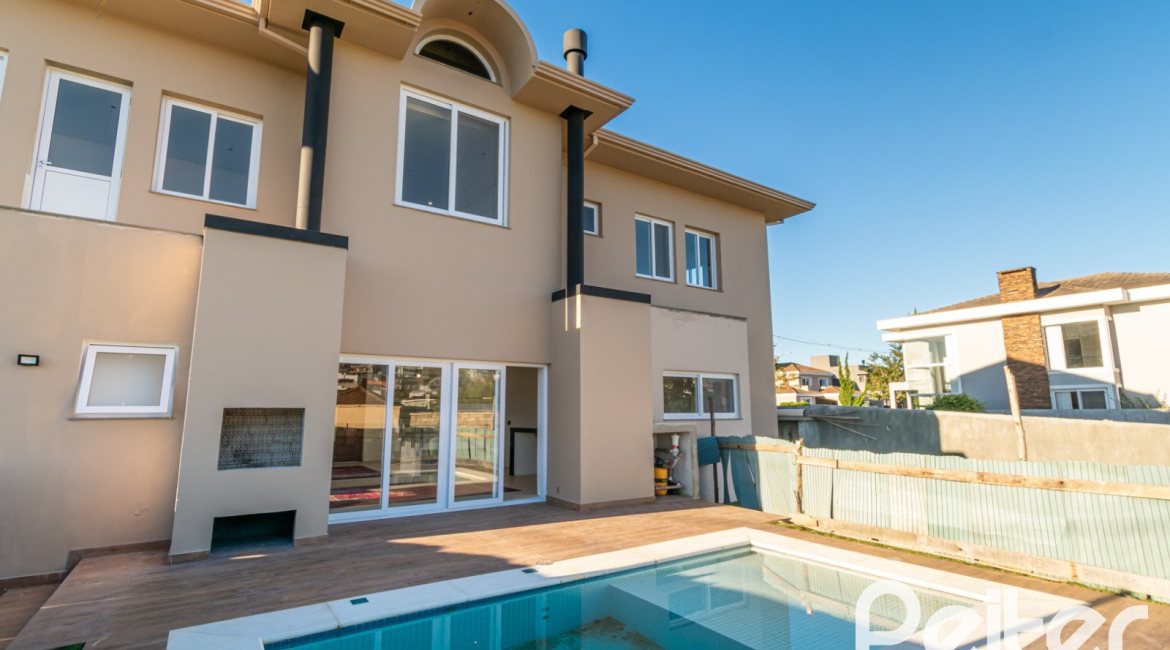 Casa em Condomínio à venda com 345m², 3 dormitórios, 3 suítes, 4 vagas, no bairro Alphaville em PORTO ALEGRE