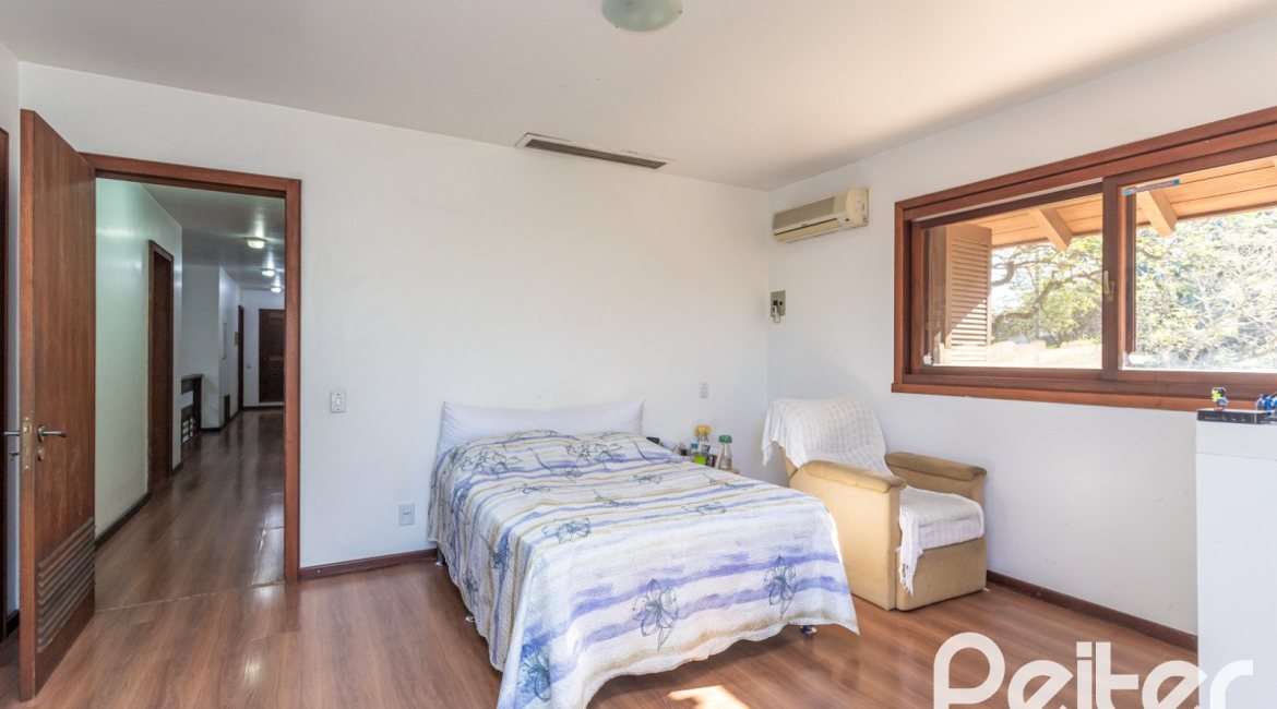 Casa em Condomínio à venda com 701m², 6 dormitórios, 2 suítes, 10 vagas, no bairro Cavalhada em PORTO ALEGRE