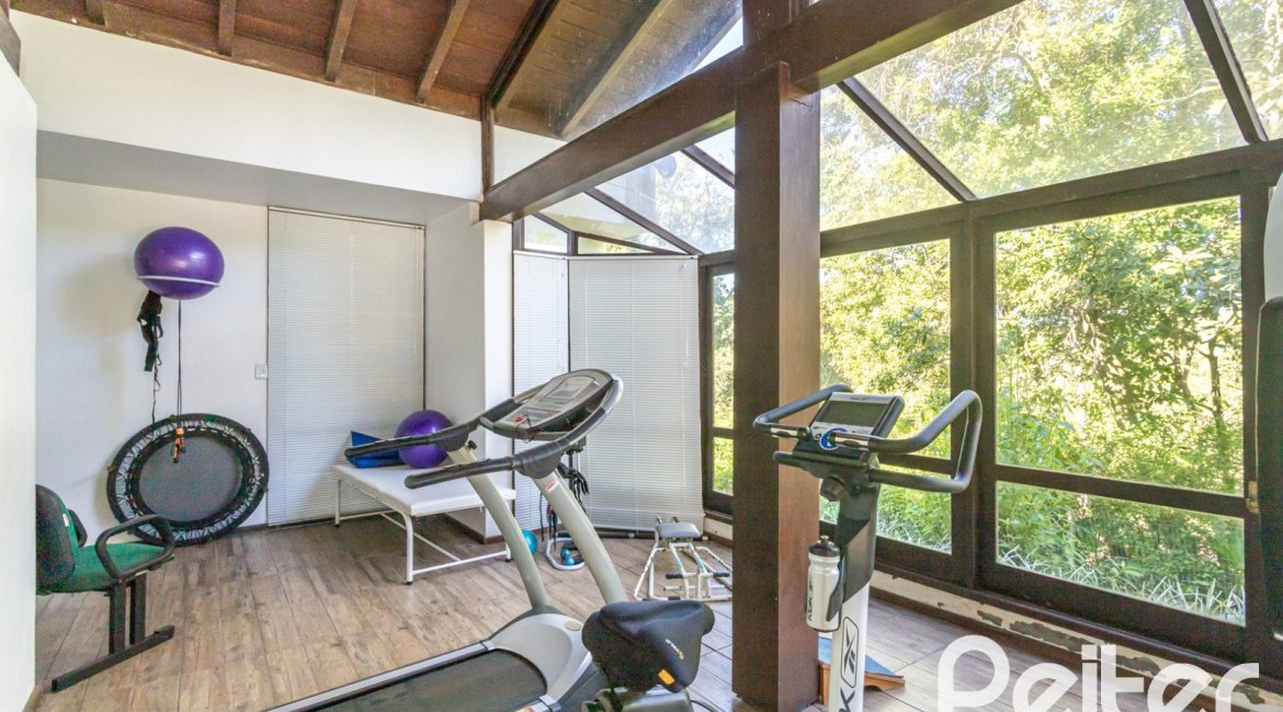 Casa em Condomínio à venda com 701m², 6 dormitórios, 2 suítes, 10 vagas, no bairro Cavalhada em PORTO ALEGRE