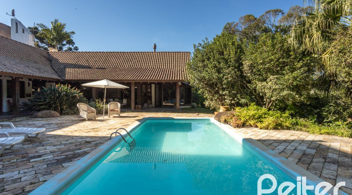 Casa em Condomínio à venda com 701m², 6 dormitórios, 2 suítes, 10 vagas, no bairro Cavalhada em PORTO ALEGRE