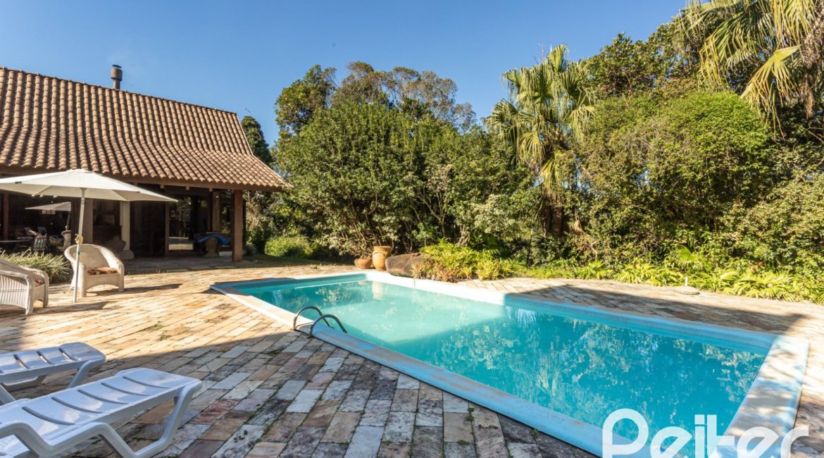 Casa em Condomínio à venda com 701m², 6 dormitórios, 2 suítes, 10 vagas, no bairro Cavalhada em PORTO ALEGRE