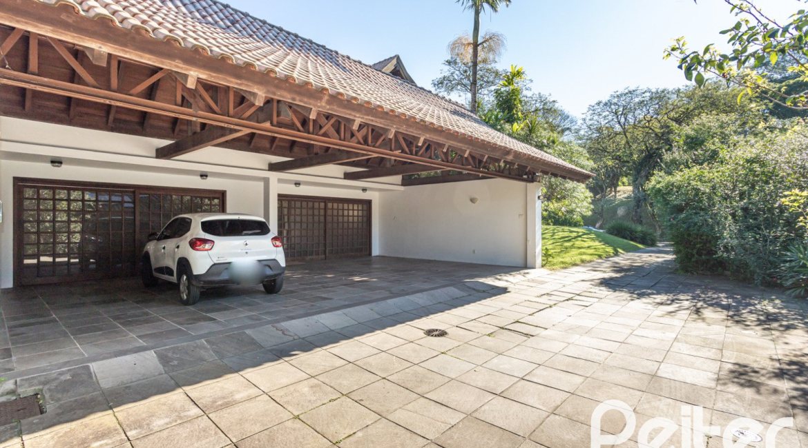 Casa em Condomínio à venda com 701m², 6 dormitórios, 2 suítes, 10 vagas, no bairro Cavalhada em PORTO ALEGRE