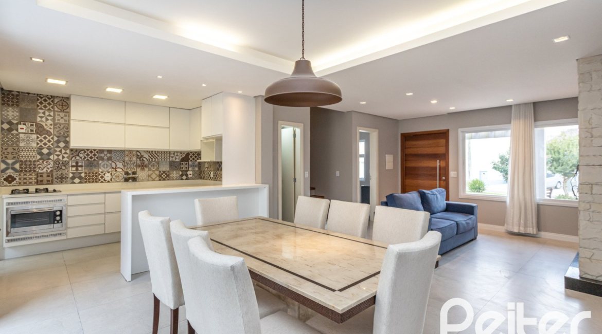 Casa em Condomínio à venda com 136m², 3 dormitórios, 1 suíte, 2 vagas, no bairro Hípica em Porto Alegre