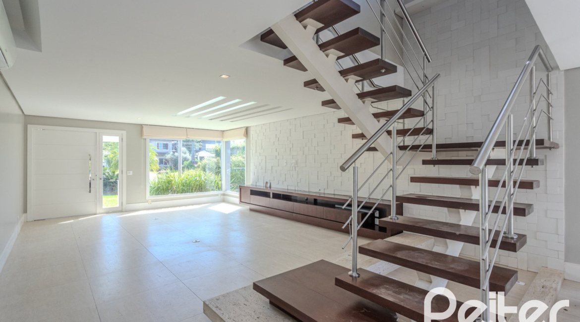 Casa em Condomínio à venda com 270m², 3 dormitórios, 2 suítes, 3 vagas, no bairro Terra Ville em PORTO ALEGRE