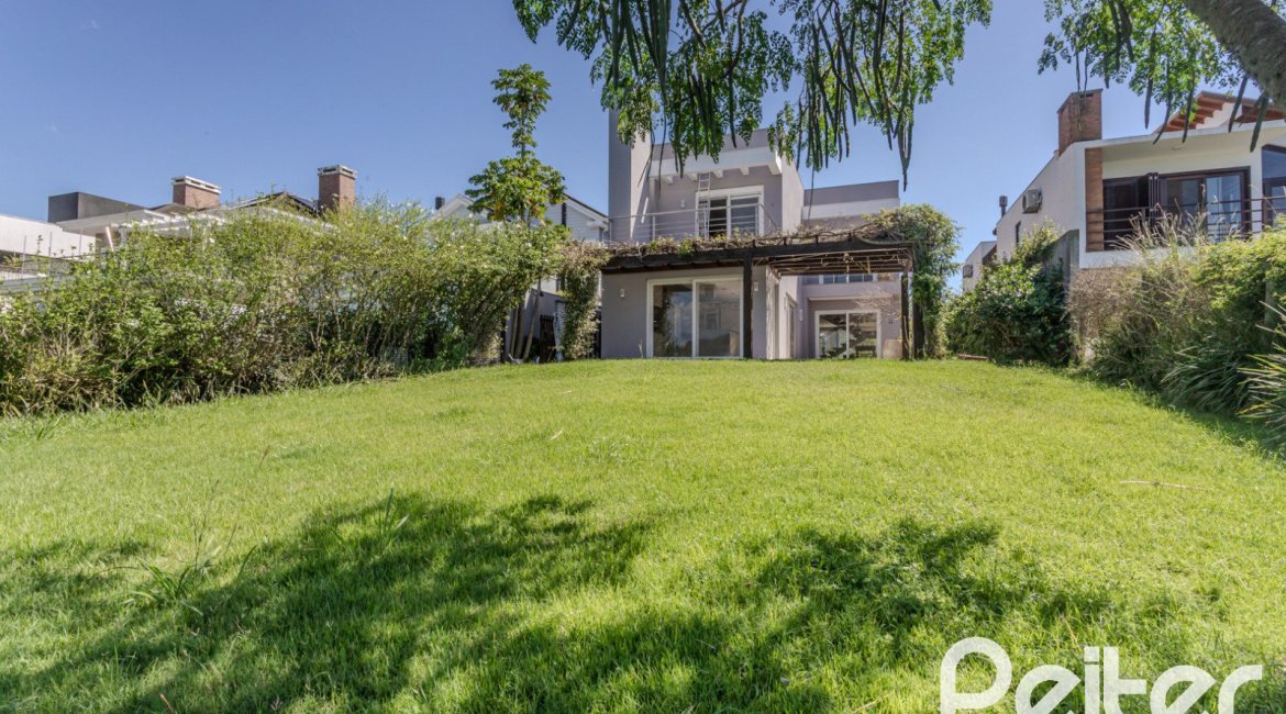 Casa em Condomínio à venda com 270m², 3 dormitórios, 2 suítes, 3 vagas, no bairro Terra Ville em PORTO ALEGRE