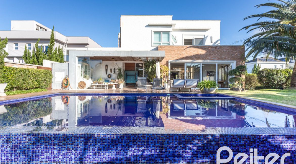 Casa em Condomínio à venda com 510m², 4 dormitórios, 4 suítes, 6 vagas, no bairro Terra Ville em PORTO ALEGRE