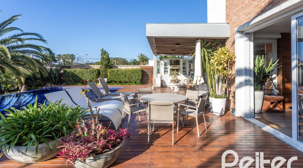 Casa em Condomínio à venda com 510m², 4 dormitórios, 4 suítes, 6 vagas, no bairro Terra Ville em PORTO ALEGRE