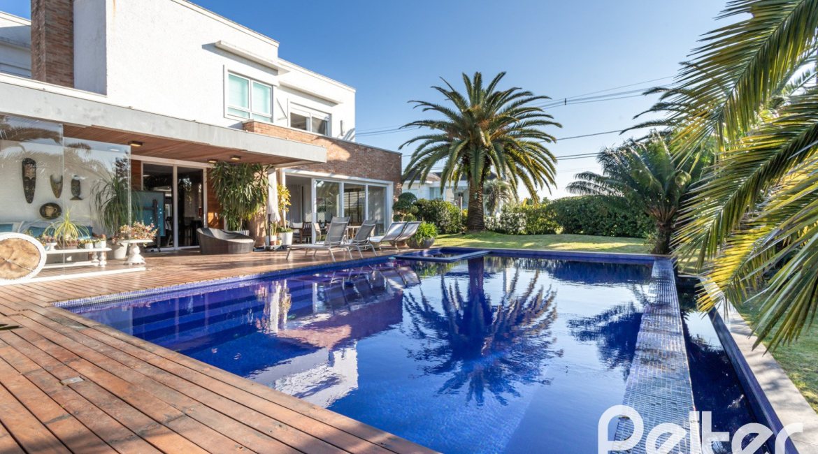 Casa em Condomínio à venda com 510m², 4 dormitórios, 4 suítes, 6 vagas, no bairro Terra Ville em PORTO ALEGRE