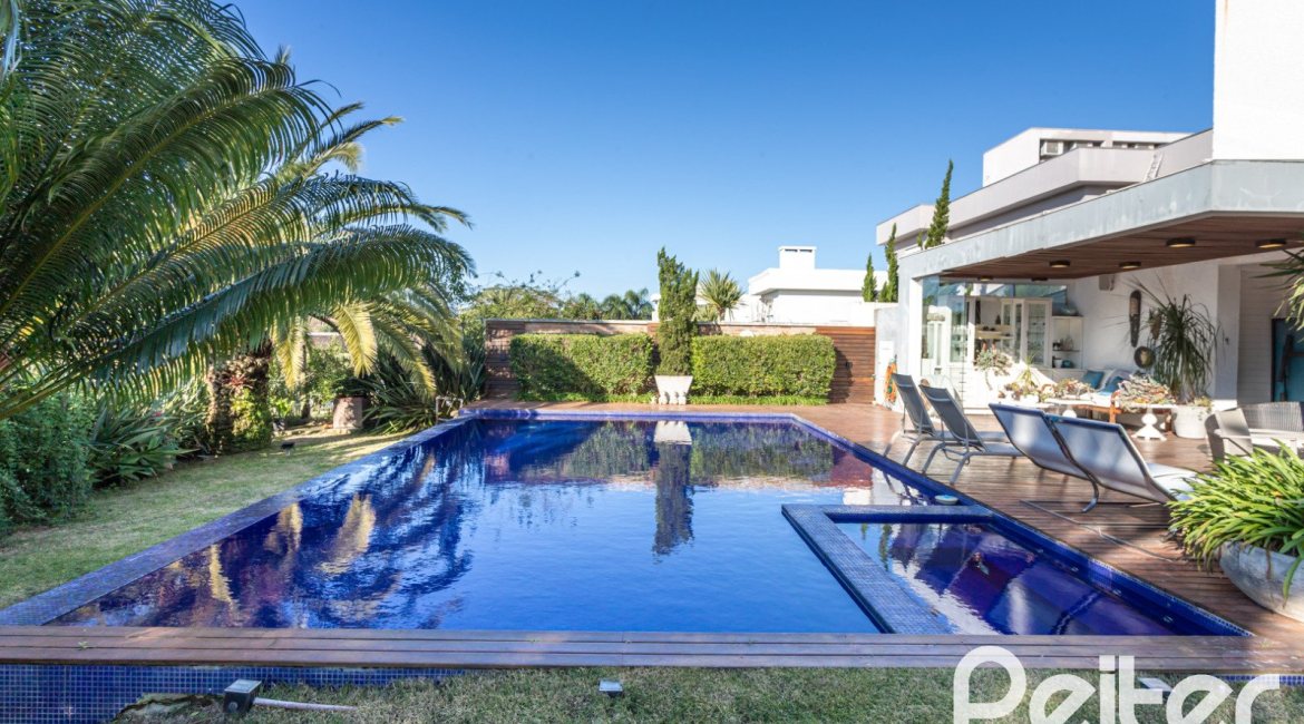 Casa em Condomínio à venda com 510m², 4 dormitórios, 4 suítes, 6 vagas, no bairro Terra Ville em PORTO ALEGRE