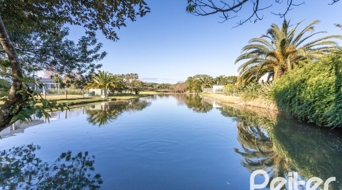 Casa em Condomínio à venda com 510m², 4 dormitórios, 4 suítes, 6 vagas, no bairro Terra Ville em PORTO ALEGRE