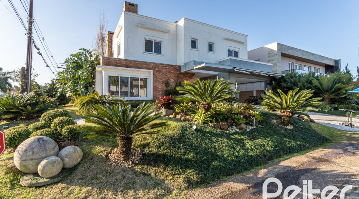 Casa em Condomínio à venda com 510m², 4 dormitórios, 4 suítes, 6 vagas, no bairro Terra Ville em PORTO ALEGRE
