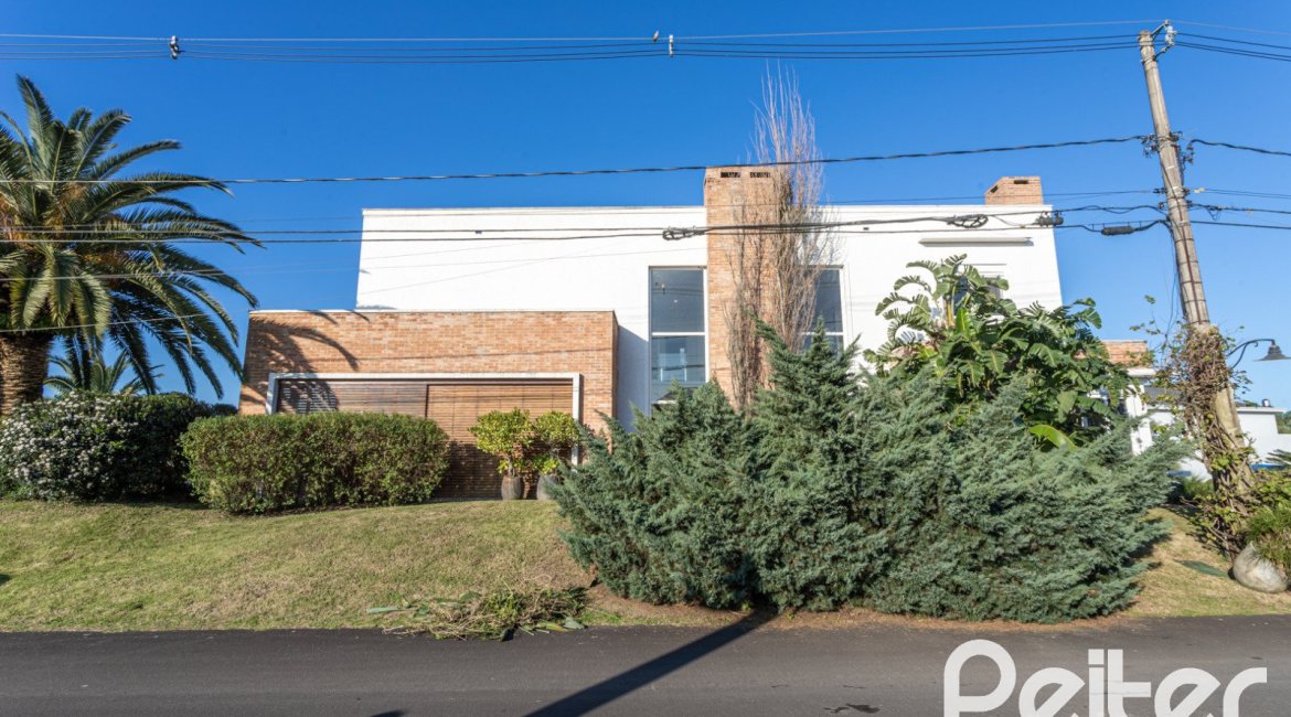 Casa em Condomínio à venda com 510m², 4 dormitórios, 4 suítes, 6 vagas, no bairro Terra Ville em PORTO ALEGRE