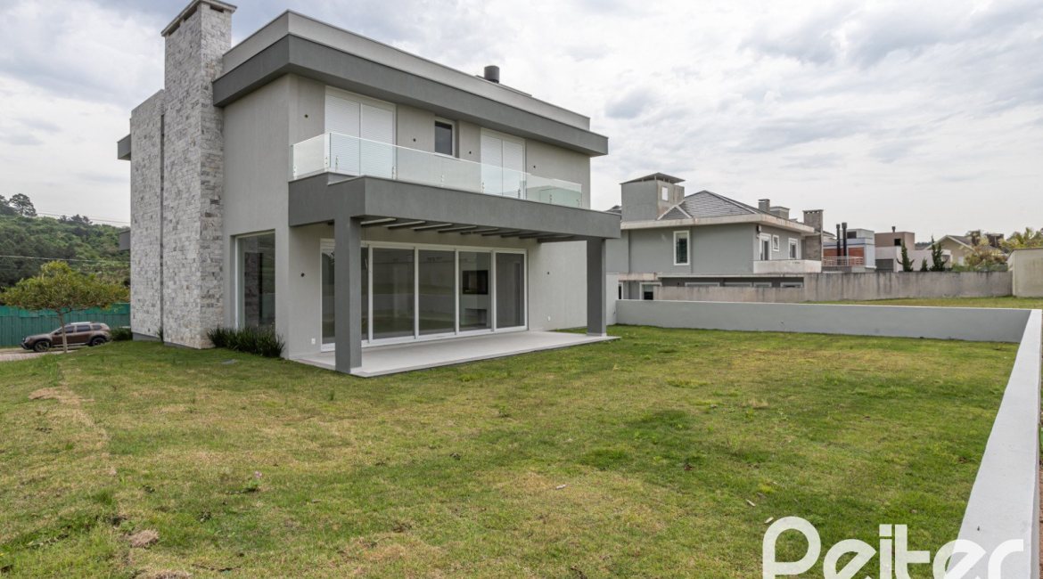 Casa em Condomínio à venda com 331m², 3 dormitórios, 3 suítes, 2 vagas, no bairro Alphaville em PORTO ALEGRE