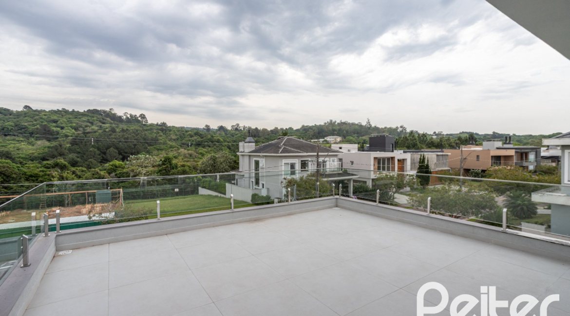 Casa em Condomínio à venda com 331m², 3 dormitórios, 3 suítes, 2 vagas, no bairro Alphaville em PORTO ALEGRE