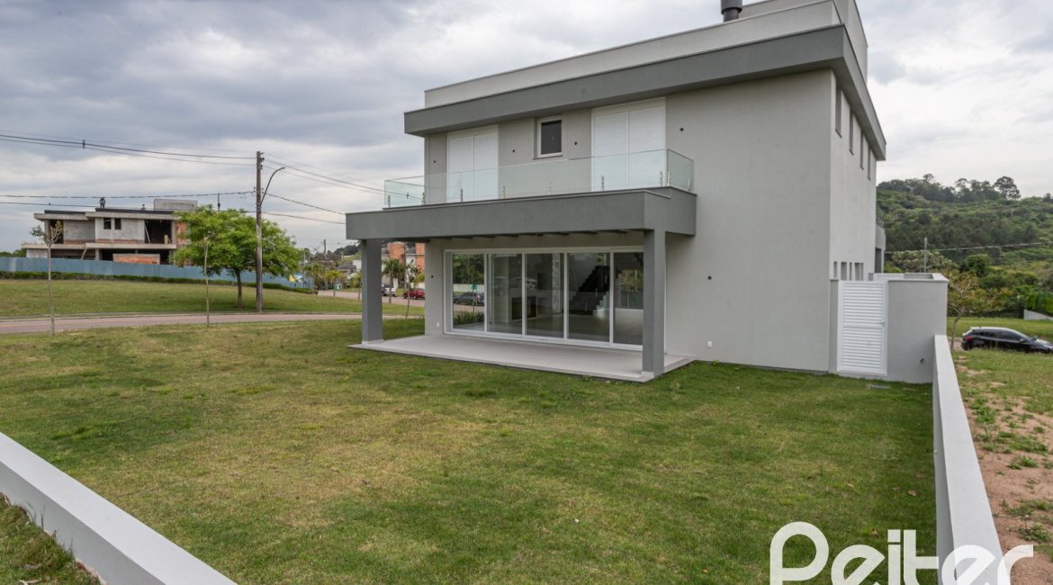 Casa em Condomínio à venda com 331m², 3 dormitórios, 3 suítes, 2 vagas, no bairro Alphaville em PORTO ALEGRE