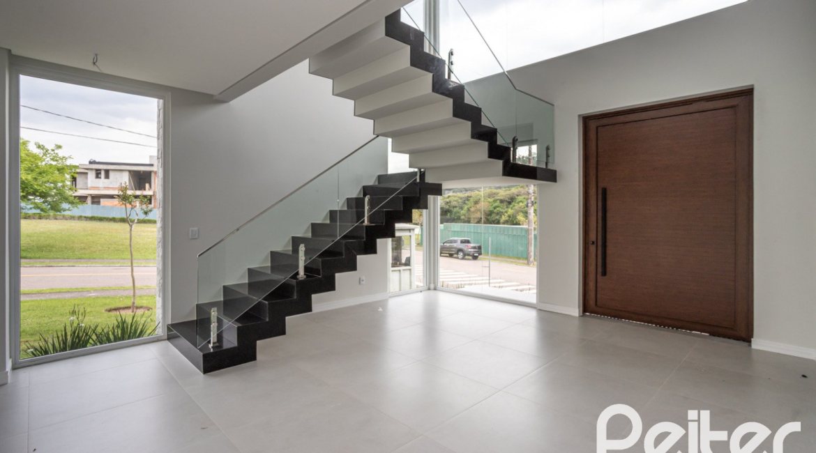 Casa em Condomínio à venda com 331m², 3 dormitórios, 3 suítes, 2 vagas, no bairro Alphaville em PORTO ALEGRE