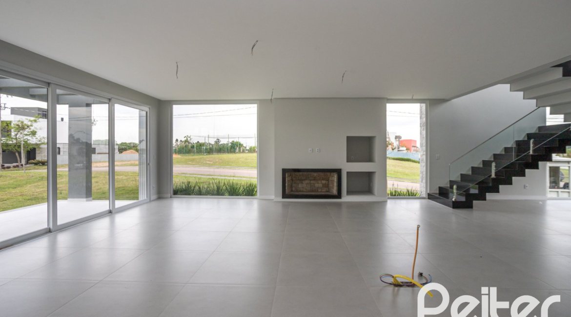 Casa em Condomínio à venda com 331m², 3 dormitórios, 3 suítes, 2 vagas, no bairro Alphaville em PORTO ALEGRE