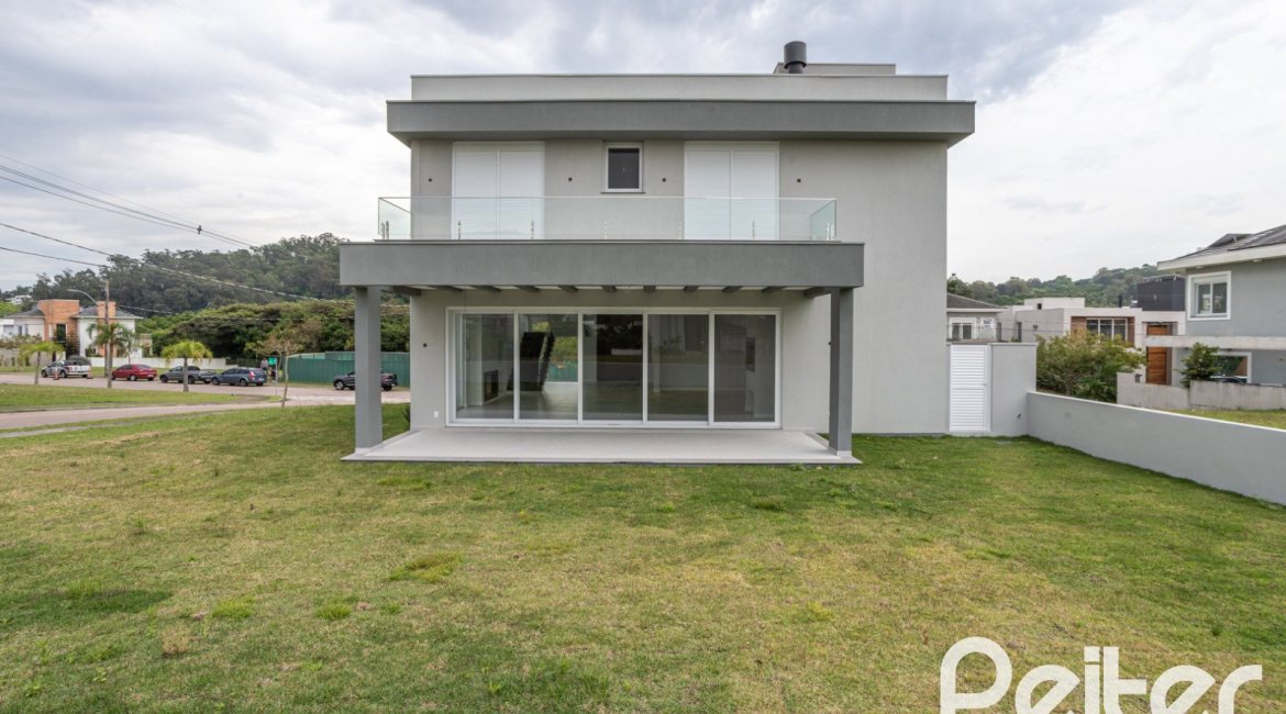 Casa em Condomínio à venda com 331m², 3 dormitórios, 3 suítes, 2 vagas, no bairro Alphaville em PORTO ALEGRE