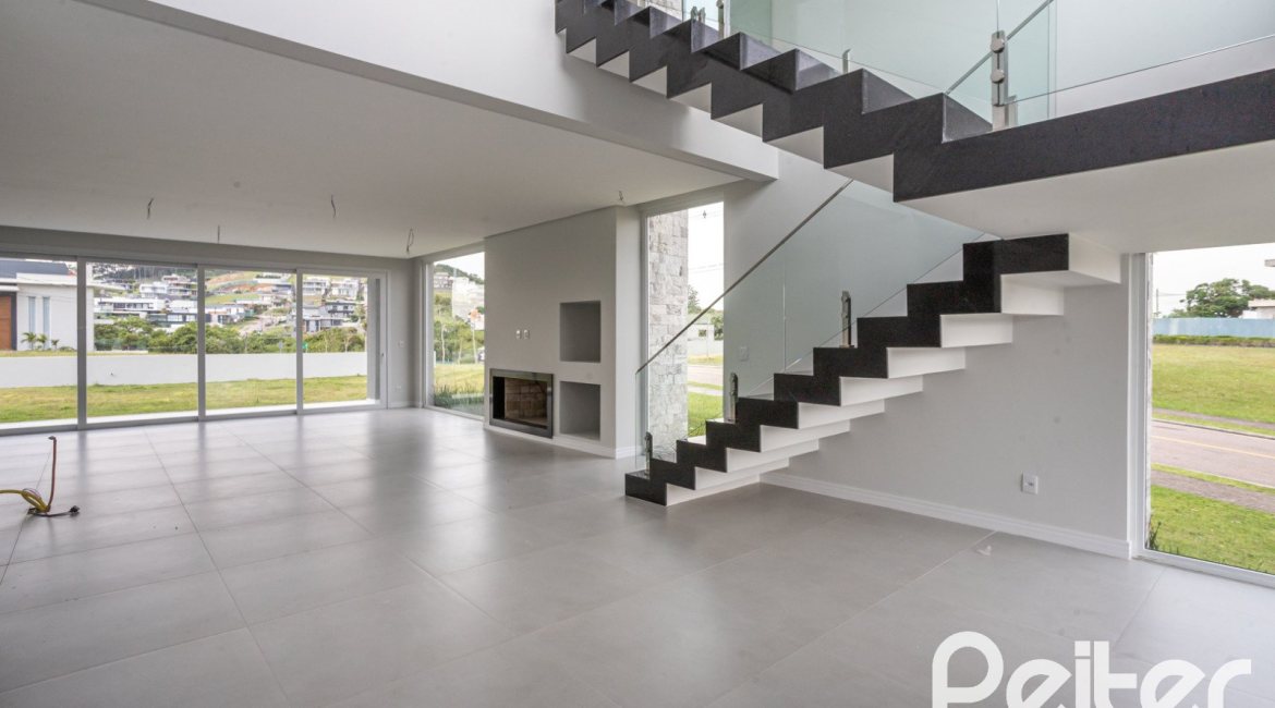 Casa em Condomínio à venda com 331m², 3 dormitórios, 3 suítes, 2 vagas, no bairro Alphaville em PORTO ALEGRE