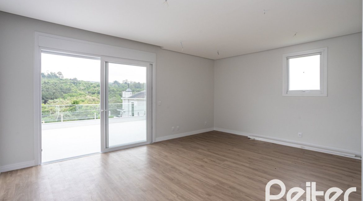 Casa em Condomínio à venda com 331m², 3 dormitórios, 3 suítes, 2 vagas, no bairro Alphaville em PORTO ALEGRE