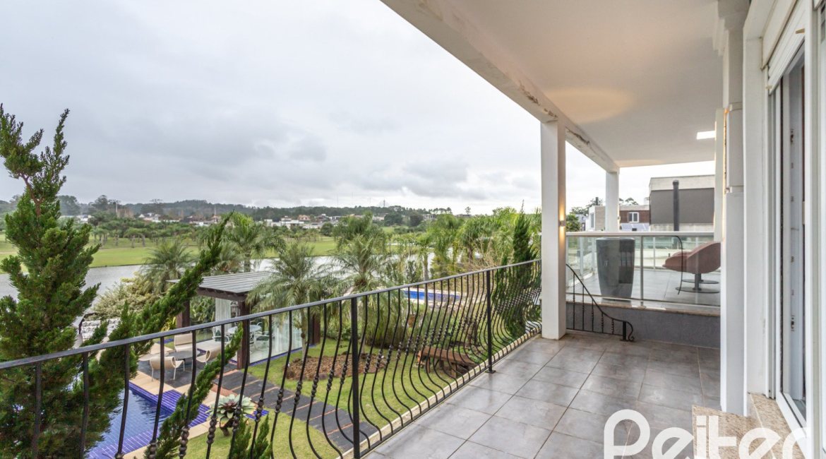 Casa em Condomínio à venda com 592m², 3 dormitórios, 3 suítes, 4 vagas, no bairro Terra Ville em PORTO ALEGRE