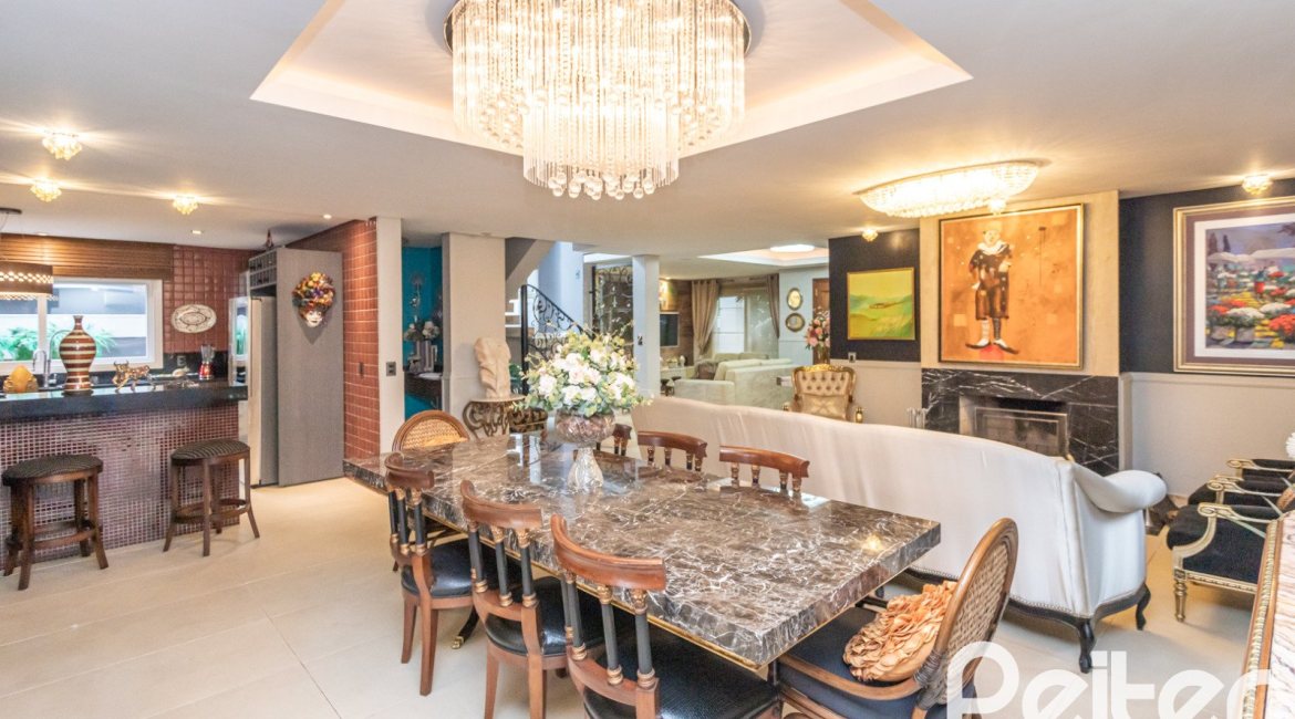 Casa em Condomínio à venda com 592m², 3 dormitórios, 3 suítes, 4 vagas, no bairro Terra Ville em PORTO ALEGRE