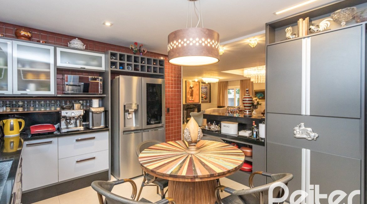 Casa em Condomínio à venda com 592m², 3 dormitórios, 3 suítes, 4 vagas, no bairro Terra Ville em PORTO ALEGRE