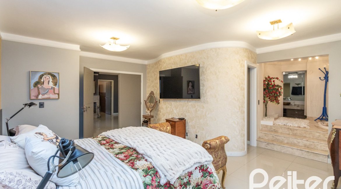 Casa em Condomínio à venda com 592m², 3 dormitórios, 3 suítes, 4 vagas, no bairro Terra Ville em PORTO ALEGRE