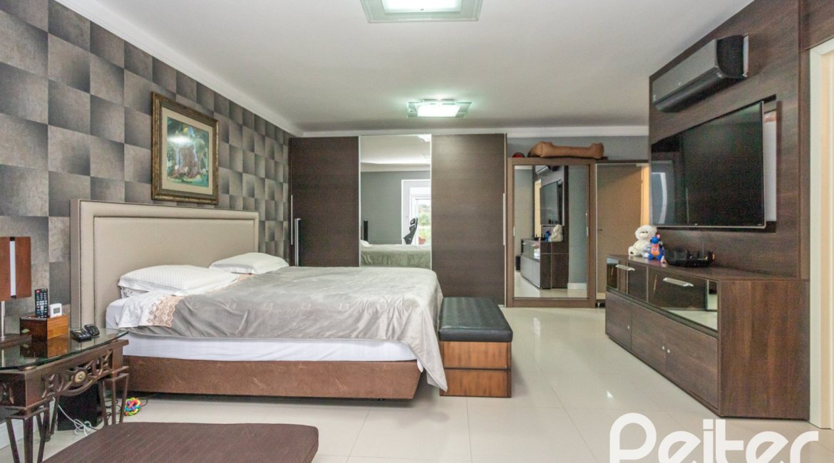 Casa em Condomínio à venda com 592m², 3 dormitórios, 3 suítes, 4 vagas, no bairro Terra Ville em PORTO ALEGRE