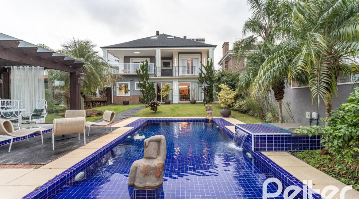 Casa em Condomínio à venda com 592m², 3 dormitórios, 3 suítes, 4 vagas, no bairro Terra Ville em PORTO ALEGRE