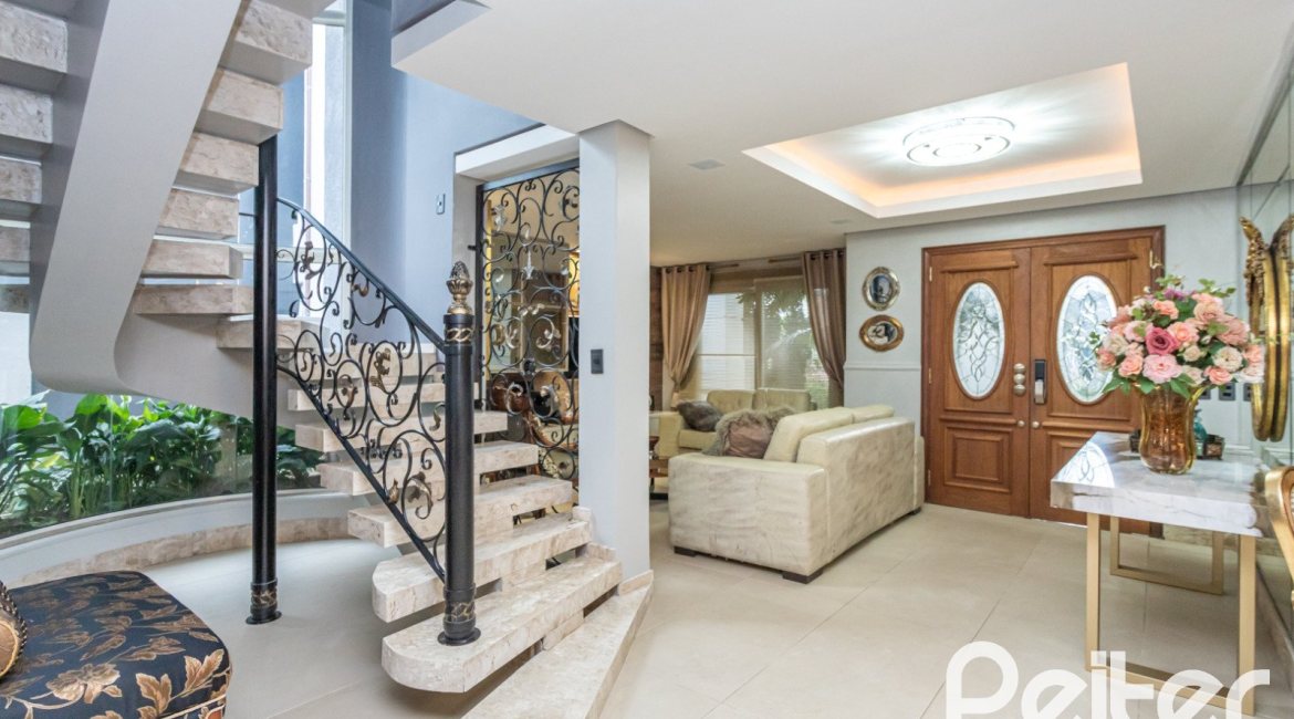 Casa em Condomínio à venda com 592m², 3 dormitórios, 3 suítes, 4 vagas, no bairro Terra Ville em PORTO ALEGRE