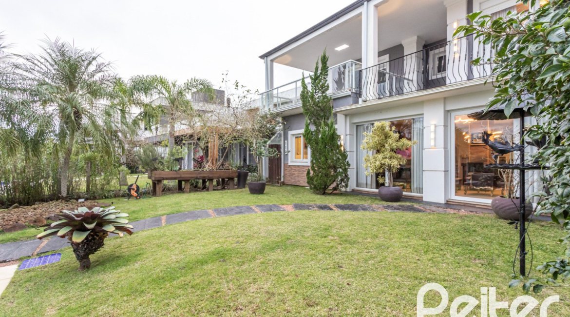 Casa em Condomínio à venda com 592m², 3 dormitórios, 3 suítes, 4 vagas, no bairro Terra Ville em PORTO ALEGRE