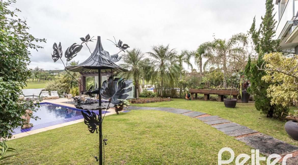 Casa em Condomínio à venda com 592m², 3 dormitórios, 3 suítes, 4 vagas, no bairro Terra Ville em PORTO ALEGRE