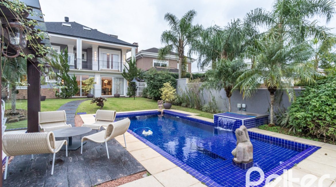 Casa em Condomínio à venda com 592m², 3 dormitórios, 3 suítes, 4 vagas, no bairro Terra Ville em PORTO ALEGRE