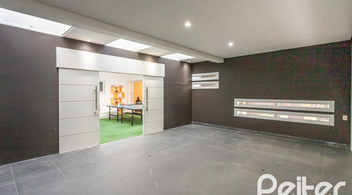 Casa em Condomínio à venda com 506m², 4 dormitórios, 4 suítes, 4 vagas, no bairro Terra Ville em Porto Alegre