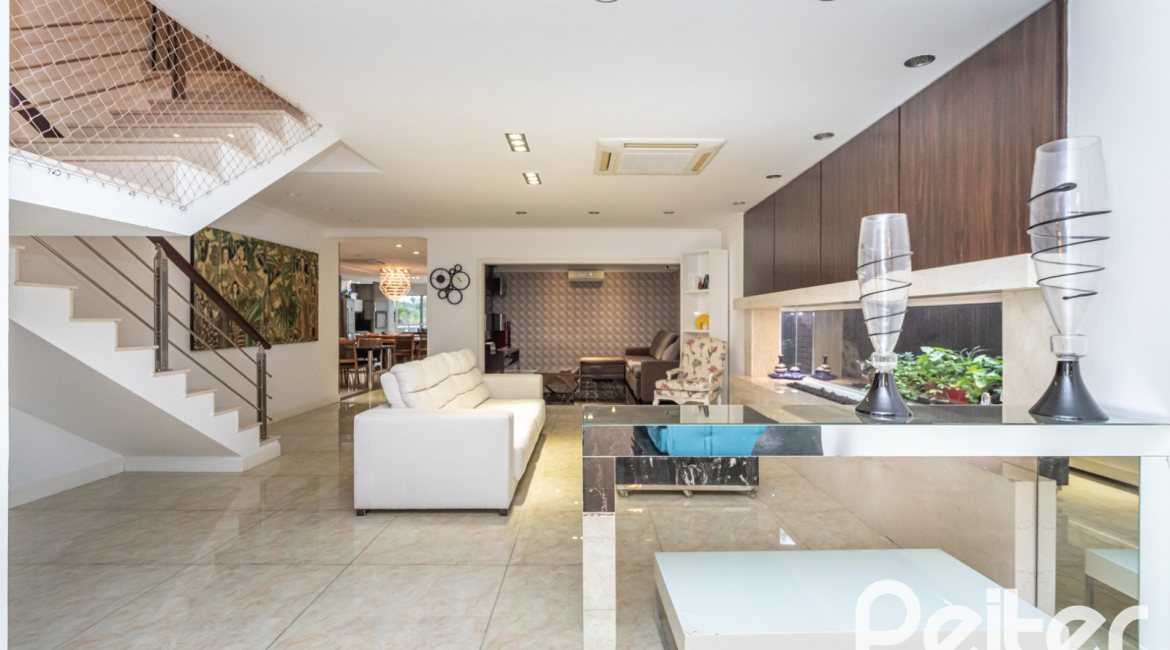 Casa em Condomínio à venda com 506m², 4 dormitórios, 4 suítes, 4 vagas, no bairro Terra Ville em Porto Alegre