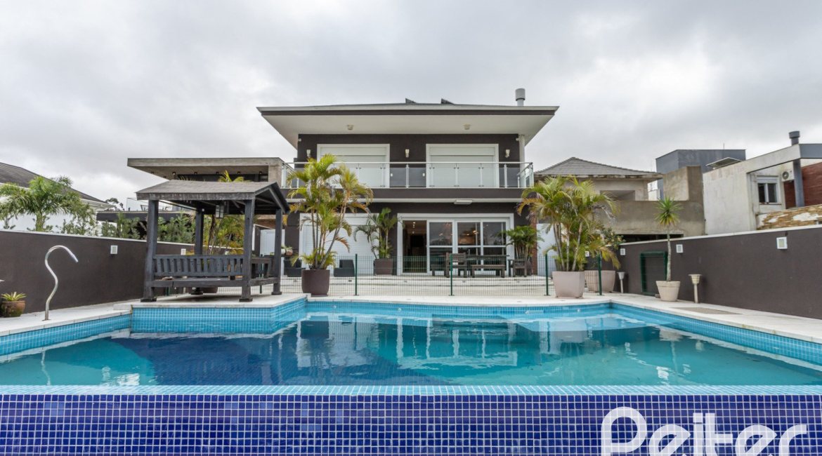 Casa em Condomínio à venda com 506m², 4 dormitórios, 4 suítes, 4 vagas, no bairro Terra Ville em Porto Alegre