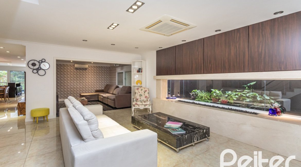 Casa em Condomínio à venda com 506m², 4 dormitórios, 4 suítes, 4 vagas, no bairro Terra Ville em Porto Alegre