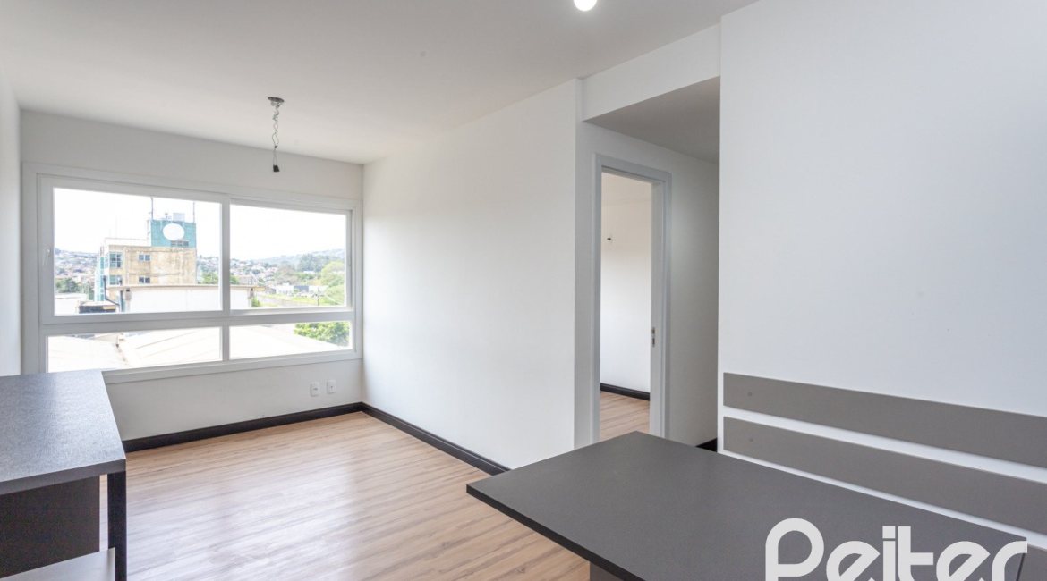 Apartamento à venda com 59m², 2 dormitórios, 1 suíte, 1 vaga, no bairro Jardim do Salso em Porto Alegre